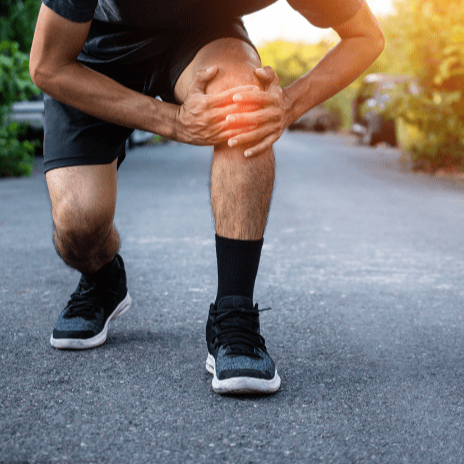 herbal pain relief oil applied to knee