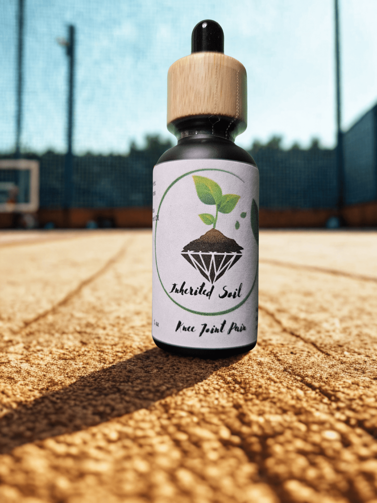 bottle of natural pain relief oil-Inherited soil herbal oil for sore muscles and joints