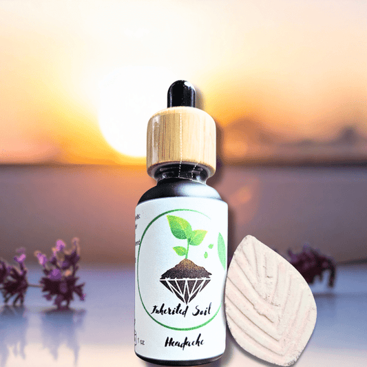 bottle of natural herbal headache relief oil from Inherited Soil