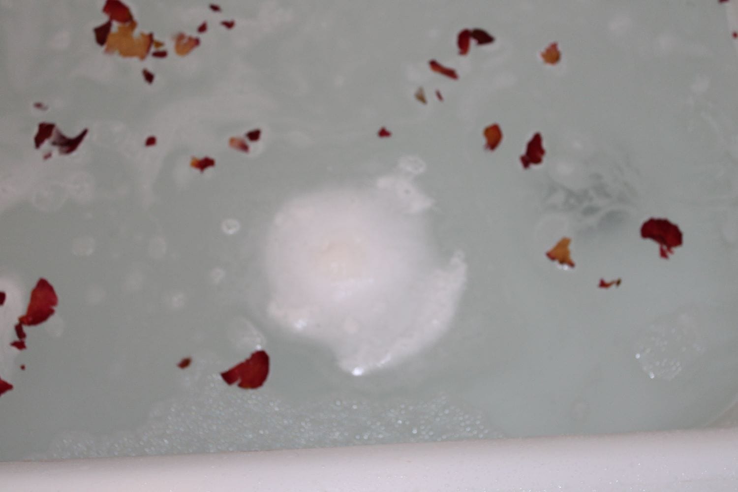 “Natural menstrual cramp relief bath bomb with roses – Inherited Soil”