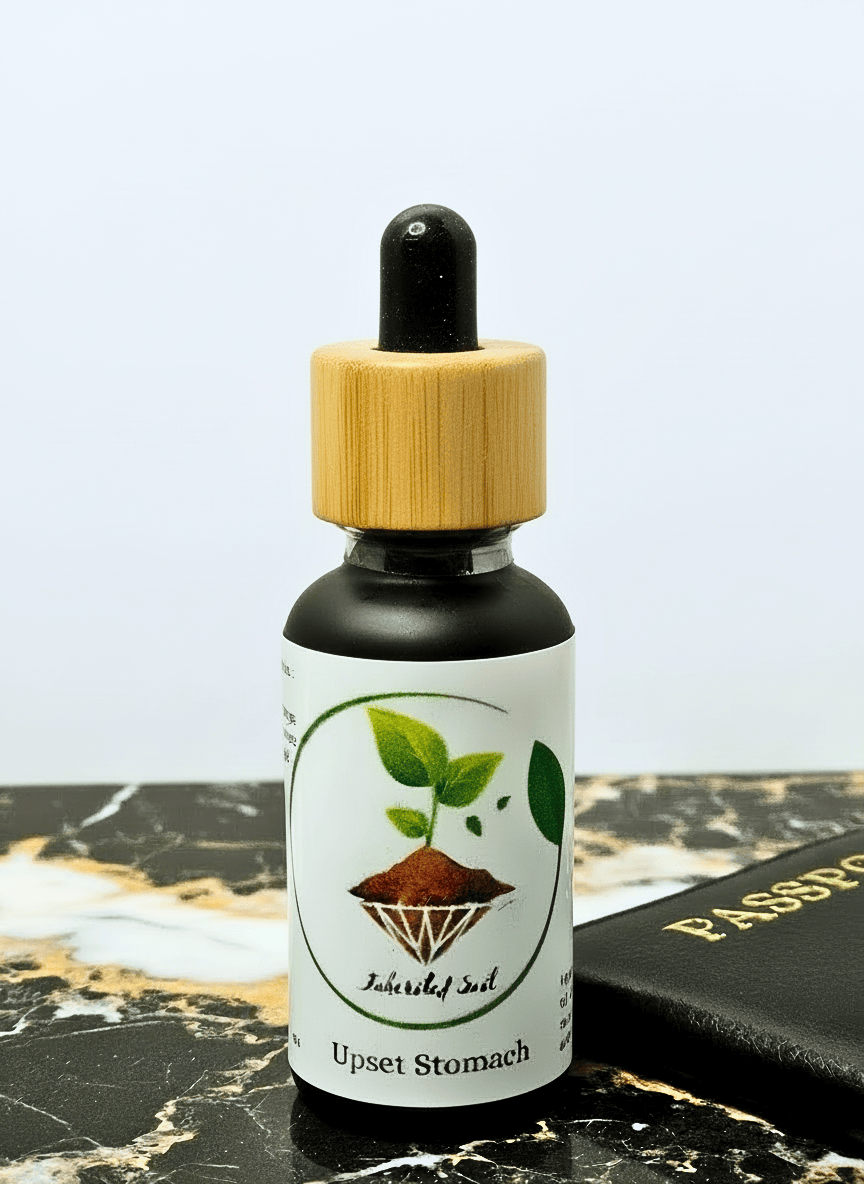 a bottle of inherited soils upset stomach natural relief oil 