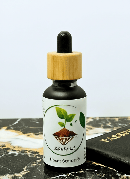a bottle of inherited soils upset stomach natural relief oil 